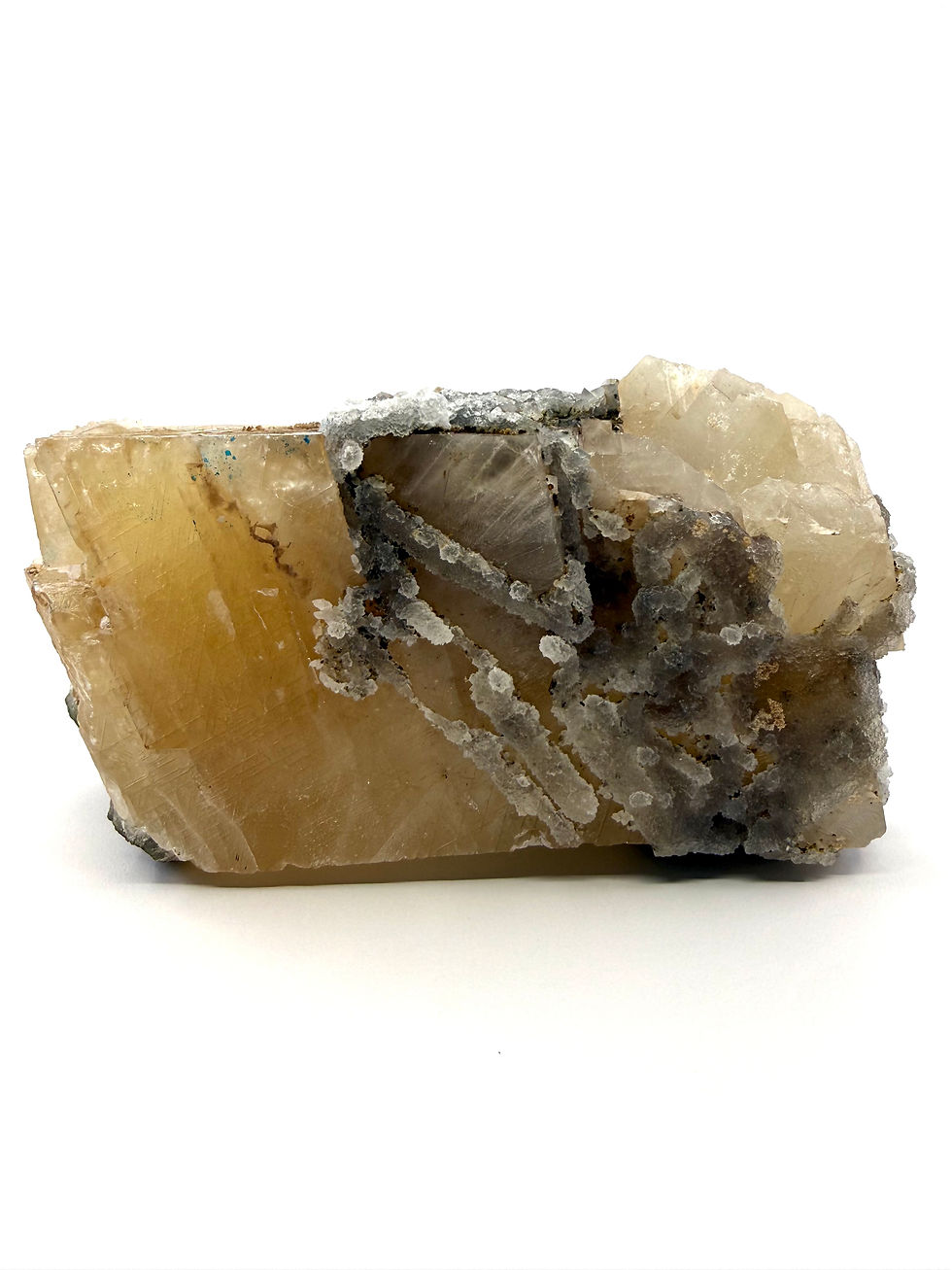 Rhombus Calcite Wrapped in Gray Chalcedony