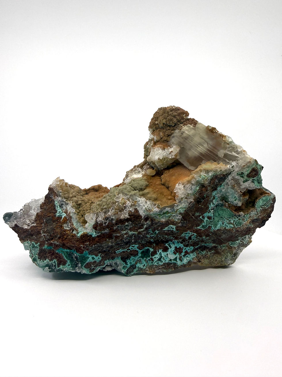 Thumbnail: Atacamite, Chrysocolla, Malachite, Selenite on Iron Oxide Matrix “Mineral Ship”