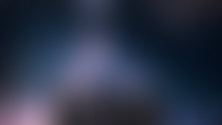 Silhouette of a woman under a clear night sky in the mountains, arms lifted in quiet celebration and spiritual connection with nature.