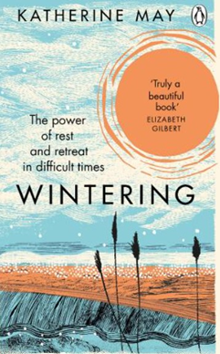 Book cover of "Wintering" by Katherine May, featuring abstract sky and grass art with the text: "The power of rest and retreat in difficult times."