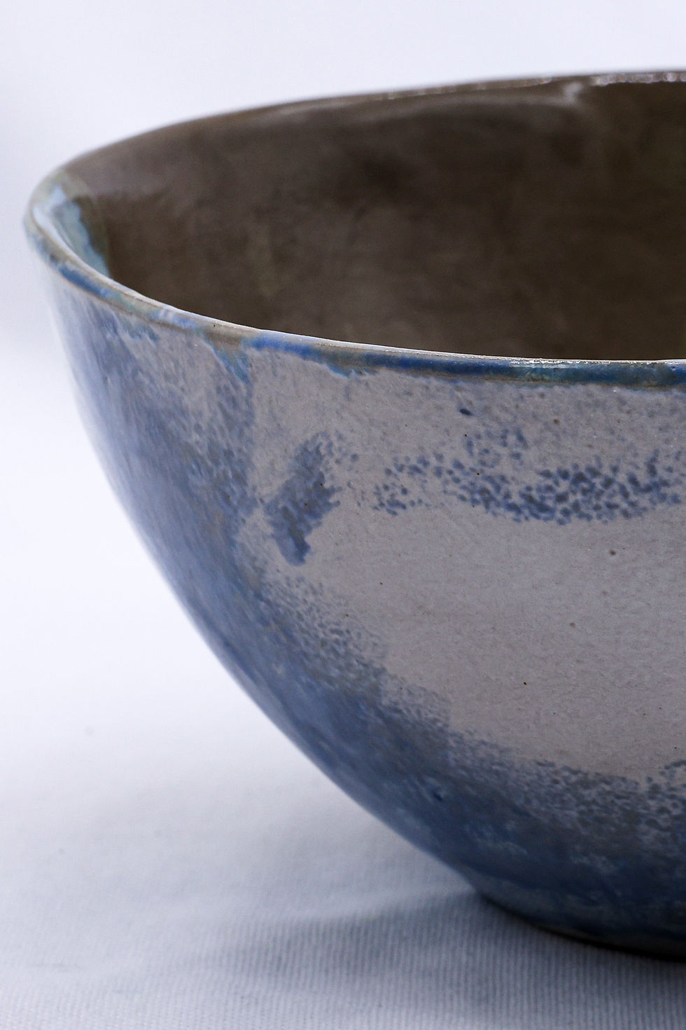 Textured ceramic bowl, blue and gray glaze