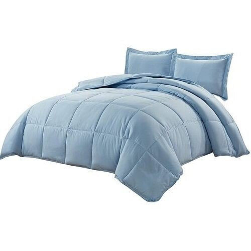 Light blue comforter set with pillows