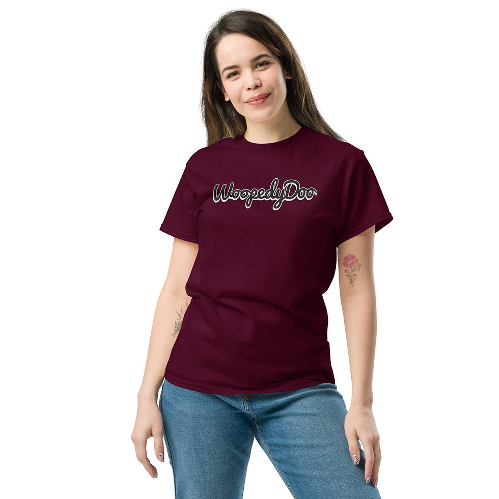 Smiling woman in maroon t-shirt with Whosayduu text