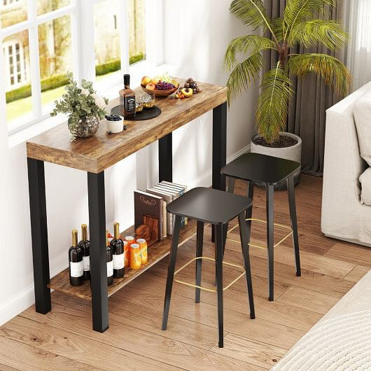 Wooden bar table and two black stools