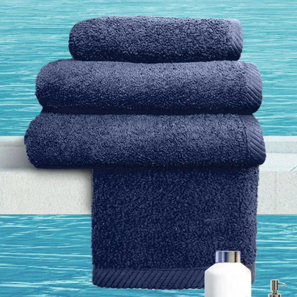 Thumbnail: Three navy blue bath towels, stacked and hanging