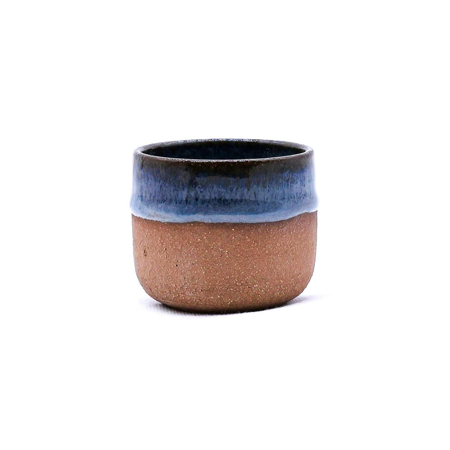 Small ceramic pot, brown base with blue glaze