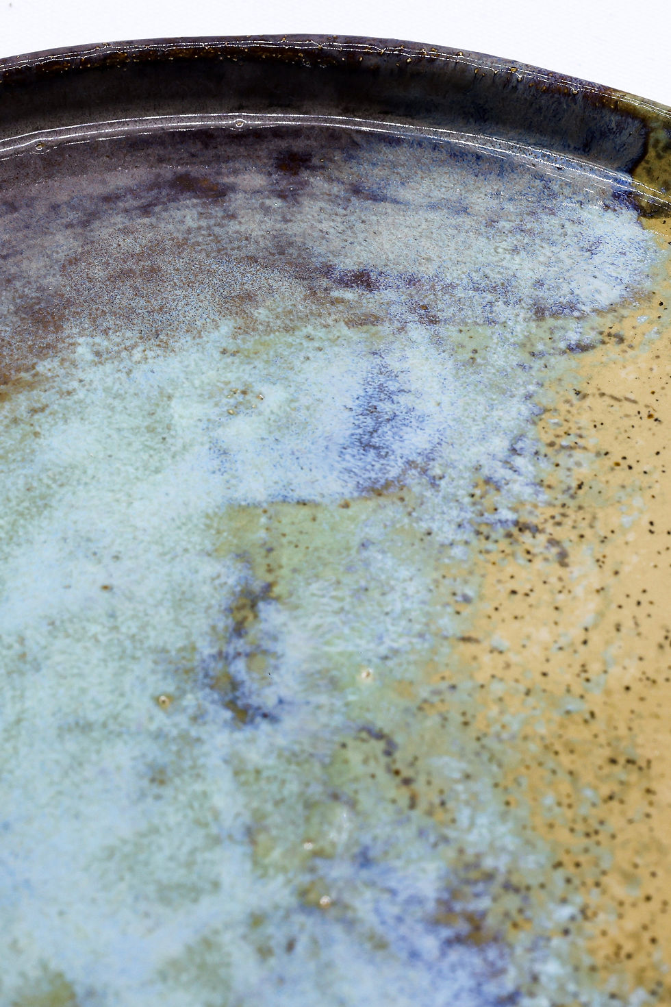 Abstract mottled pattern in white, beige, and brown