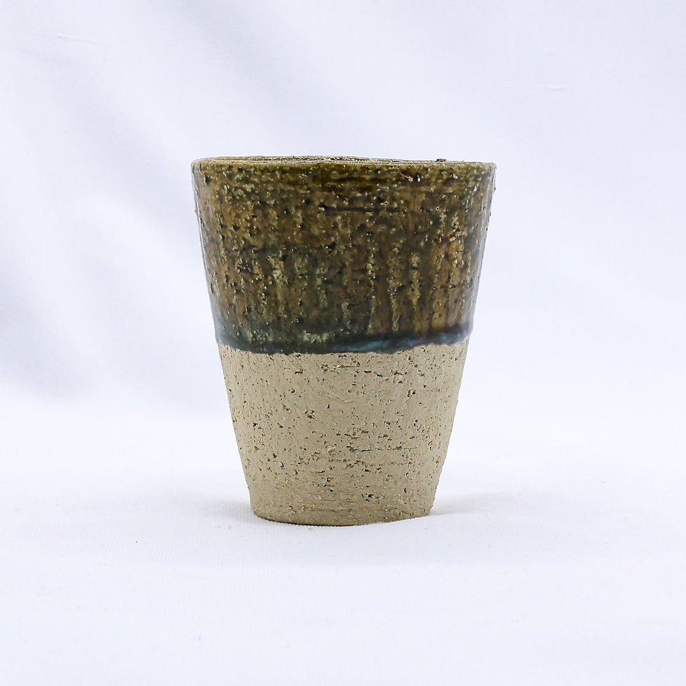 Two-toned ceramic cup with textured glaze