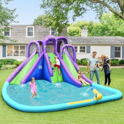 Thumbnail: Family playing on inflatable water slide in backyard.