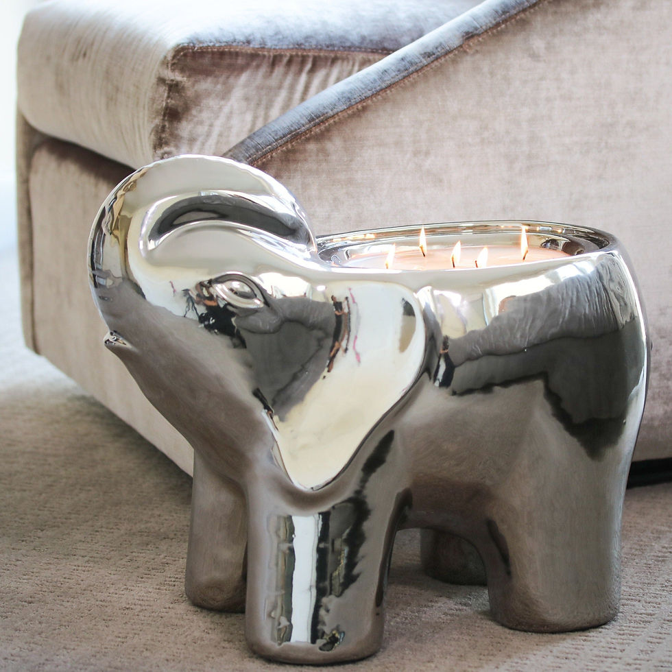 Thumbnail: Silver elephant candle holder with lit candles