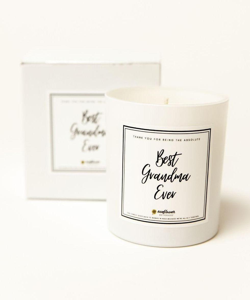 White candle in jar labeled 'Best Grandma Ever' with box