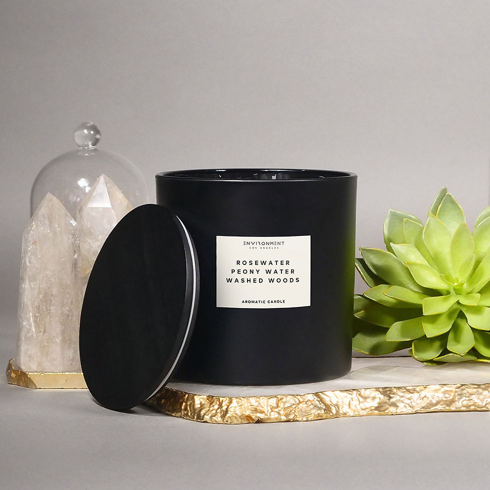 Thumbnail: Black candle with lid, label reads Rosewater Peony Water Musked Woods