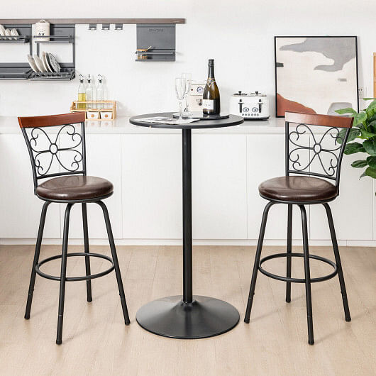 Two brown cushioned swivel barstools and a black bar table.