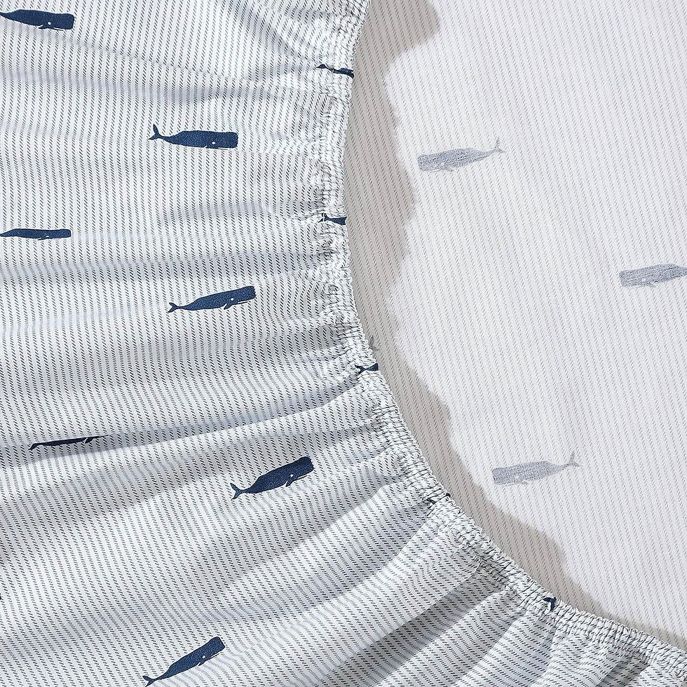 White fitted sheet with blue whale and stripe pattern