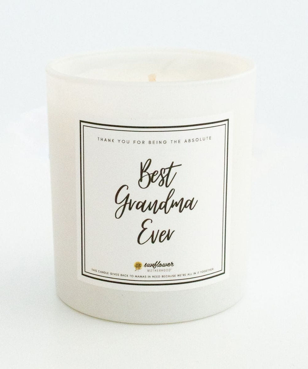 Frosted white candle that says 'Best Grandma Ever'