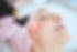 Close up portrait of a young woman patient receiving a laser treatment in a spa salon.jpg