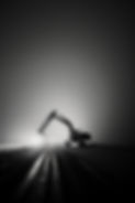 large-construction-vehicle-is-road-dark.jpg