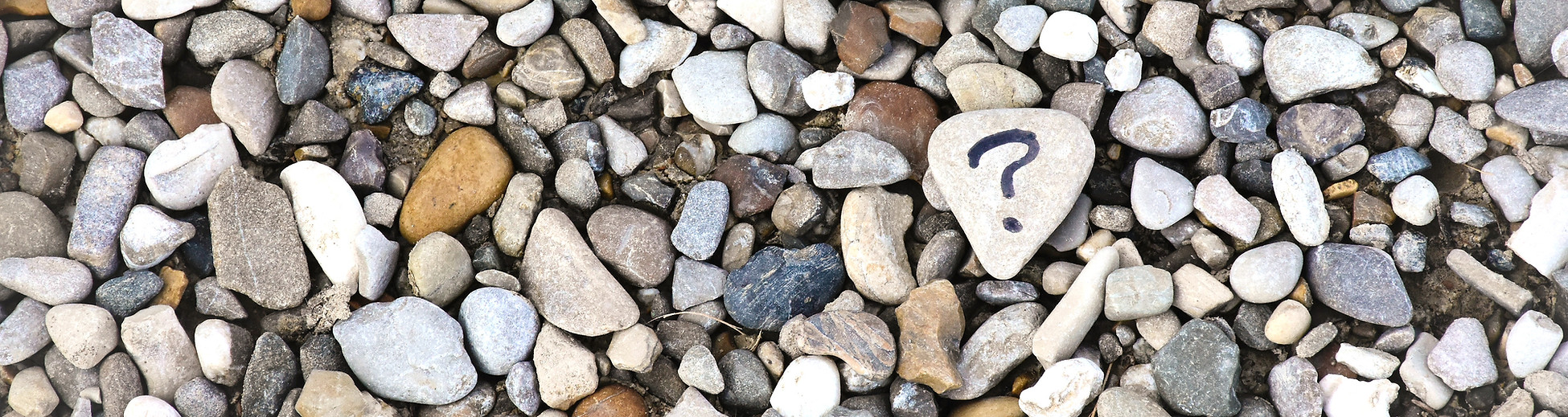 gray and brown stones on gray ground_edi
