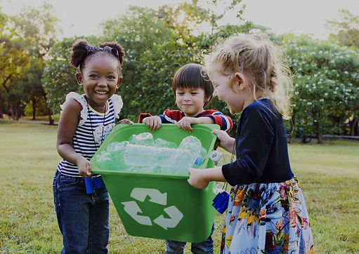 Girls Carrying a Recycling Bin_edited.jpg