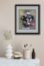 This colored pencil drawing by Dean Huck depicts Raider player Bo Jackson in action carrying a football - in a black frame