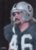 This colored pencil drawing by Dean Huck depicts Raider player Todd Christensen. He is shown in profile, wearing a helmet and a black jersey with the number 46. His focused expression and detailed features are highlighted against a dark background.