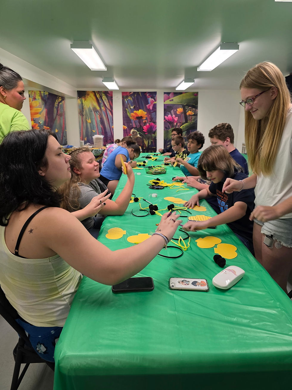 Photo collage from Vacation Bible School 2025 at Second Baptist Church Keyser, WV showing volunteers in bright green shirts,