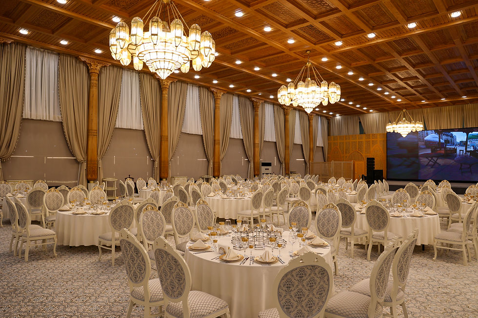 elegant-banquet-hall-with-chandeliers-round-tables.jpg