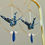 Miniature : Grues japonaises Origami bleu marine pétales blancs, créoles simples