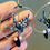 Miniature : Grues japonaises Origami bleu marine pétales blancs, créoles simples