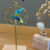 Miniature : Oiseaux Origami jaunes et verts graphiques, créoles doubles