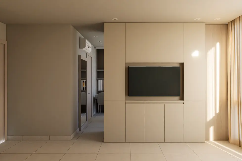 Custom beige TV wall unit with built-in cabinets in a modern, neutral-toned bedroom.