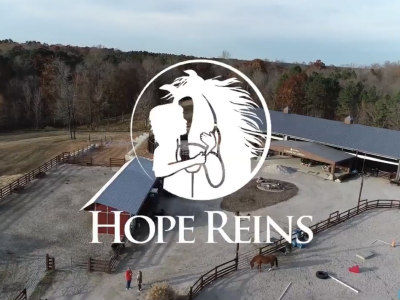 Aerial drone photo of Hope Reins of Raleigh, a non-profit equestrian facility that pairs kids in crisis with horses for hope and healing, designed by Sustainable Stables
