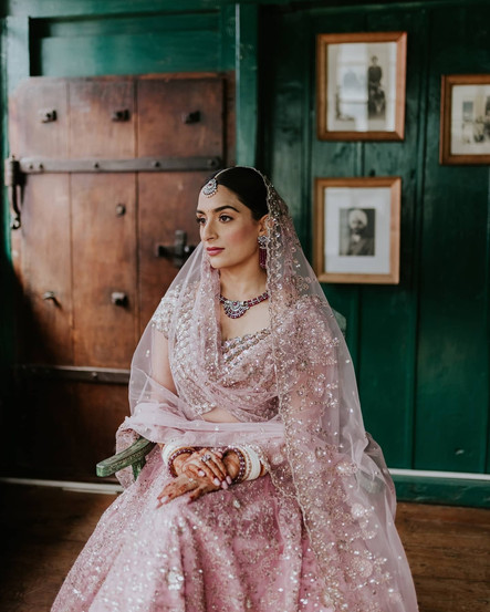 Tripat adorned in heirloom jewellery wearing her Kotwara Bridal Lehenga, designed by Sama Ali