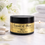 Thumbnail: Essence of Allure Body Butter jar with white flowers blooming