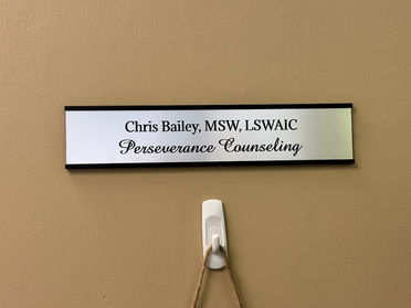 Door placard stating Chris Bailey, MSW, LSWAIC
Perseverance Counseling