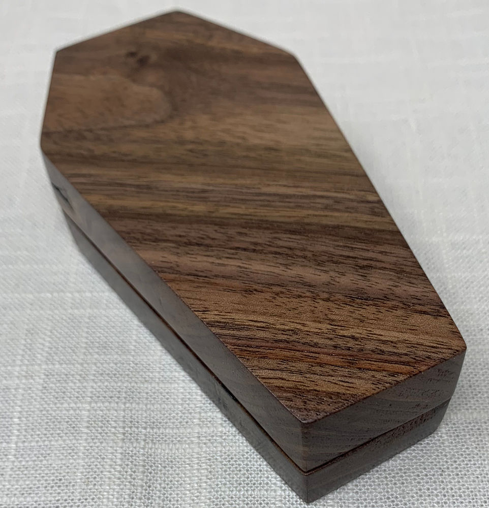 Thumbnail: Dice coffin