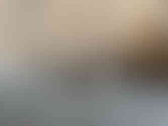 a cat sleeping in civita di bagnoregio hilltop village