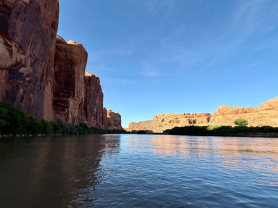 View from the boat on the Colorado River with red sandstone formations
