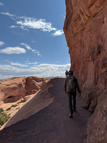 Hiking to Delicate Arch on a trail