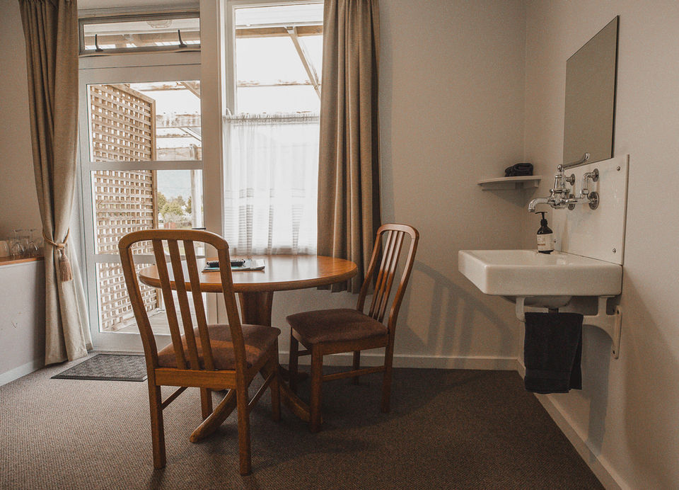 Sink And Table Motel Unit