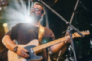 Arun OConnor Gold Guitar winner performing at Top Padock Music Festival New Years Eve Lake Wanaka