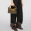 Thumbnail: Small Leather Puzzle Edge Top-Handle Bag
