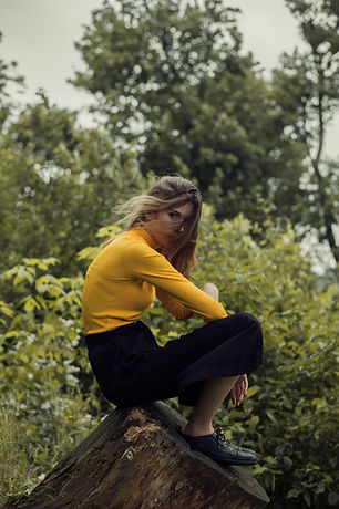 Sitting on a Tree Trunk