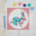 Completed painting of a whimsical bunny design, colors applied with smart sticker removed, revealing finished artwork.
