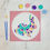 Thumbnail: Completed painting of a whimsical bunny design, colors applied with smart sticker removed, revealing finished artwork.