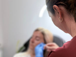 cosmetic nurse providing personalised skin treatment in clinic Nelson Tasman