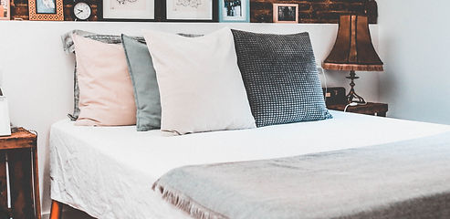 Rustic%20Bed%20with%20Pillows_edited.jpg