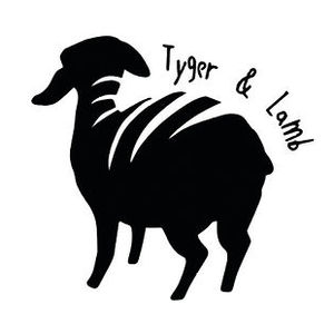 Silhouetted view of a lamb from behind with white stripes trailing it's back with the words Tyger & Lamb