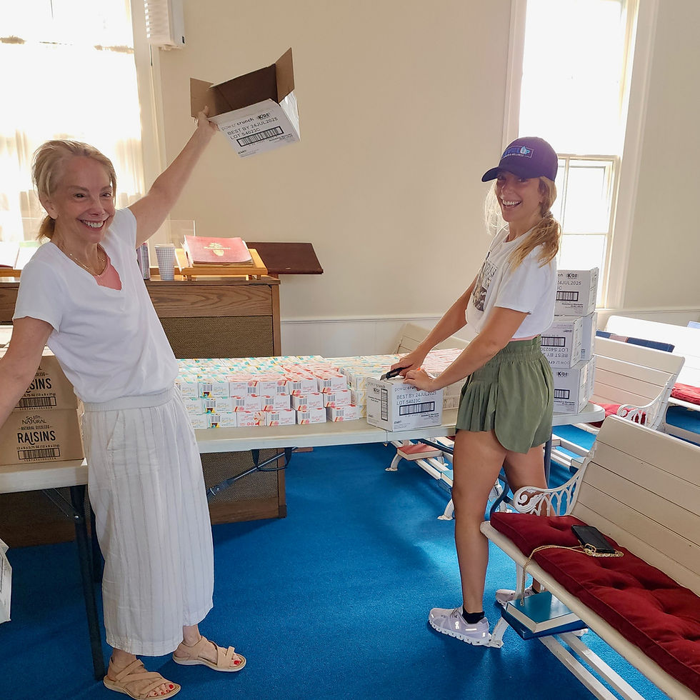 Volunteer Karen Reuben and daughter Savvy