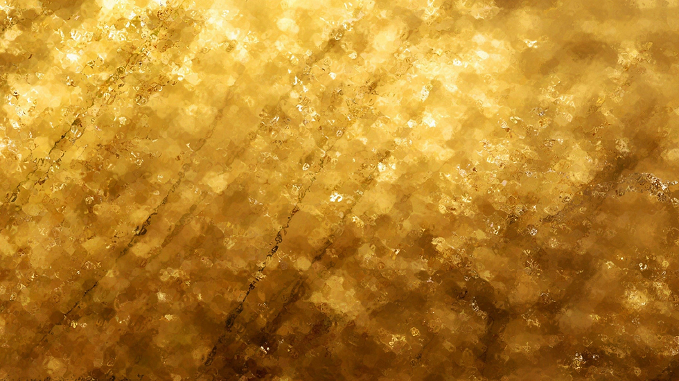 Wide landscape abstract gold textured background with shimmering light and soft diagonal streaks.